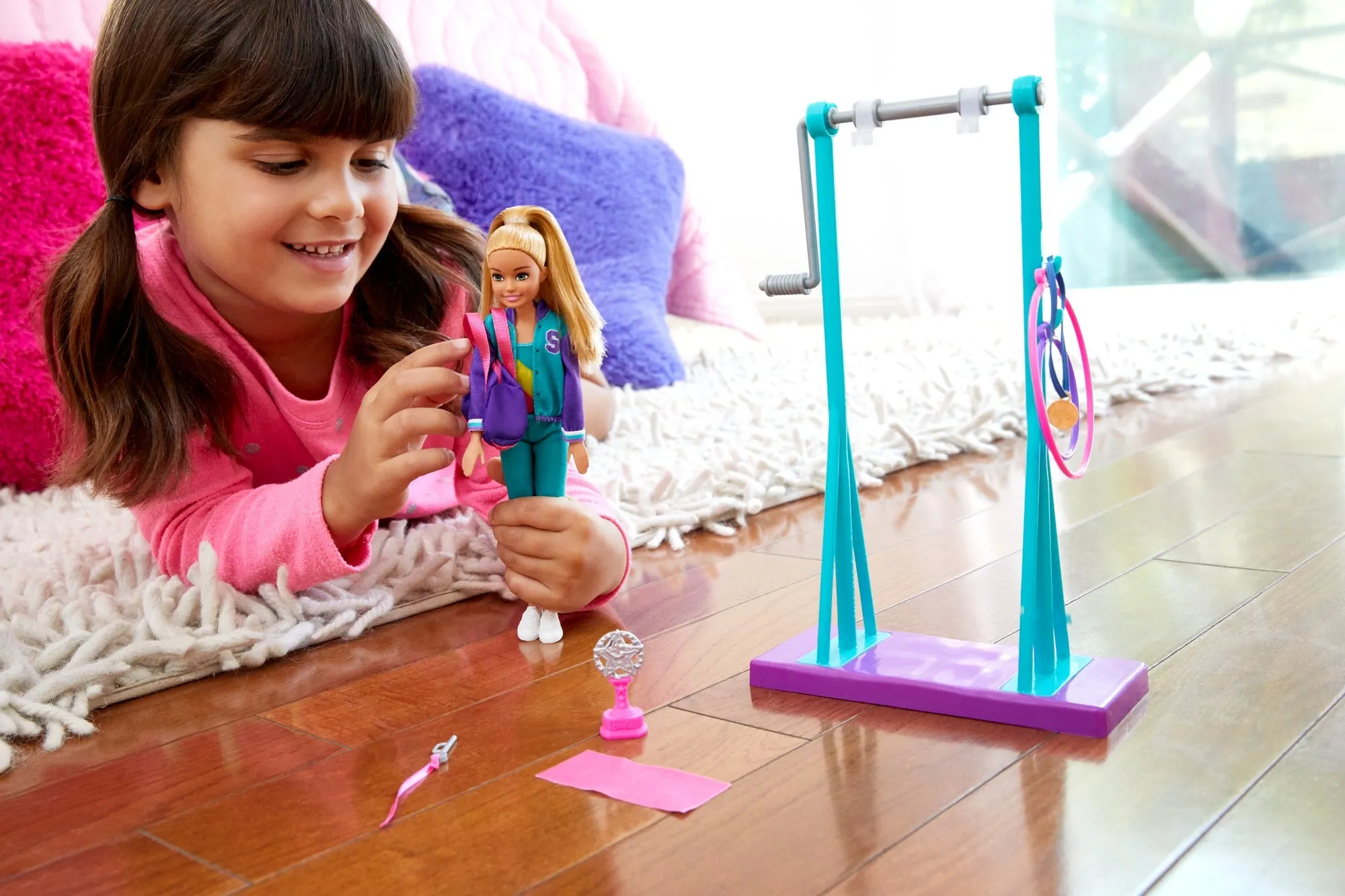 Barbie Team Stacie Doll and Gymnastics Playset with Spinning Bar and 7 Themed Accessories for Kids Ages 3 