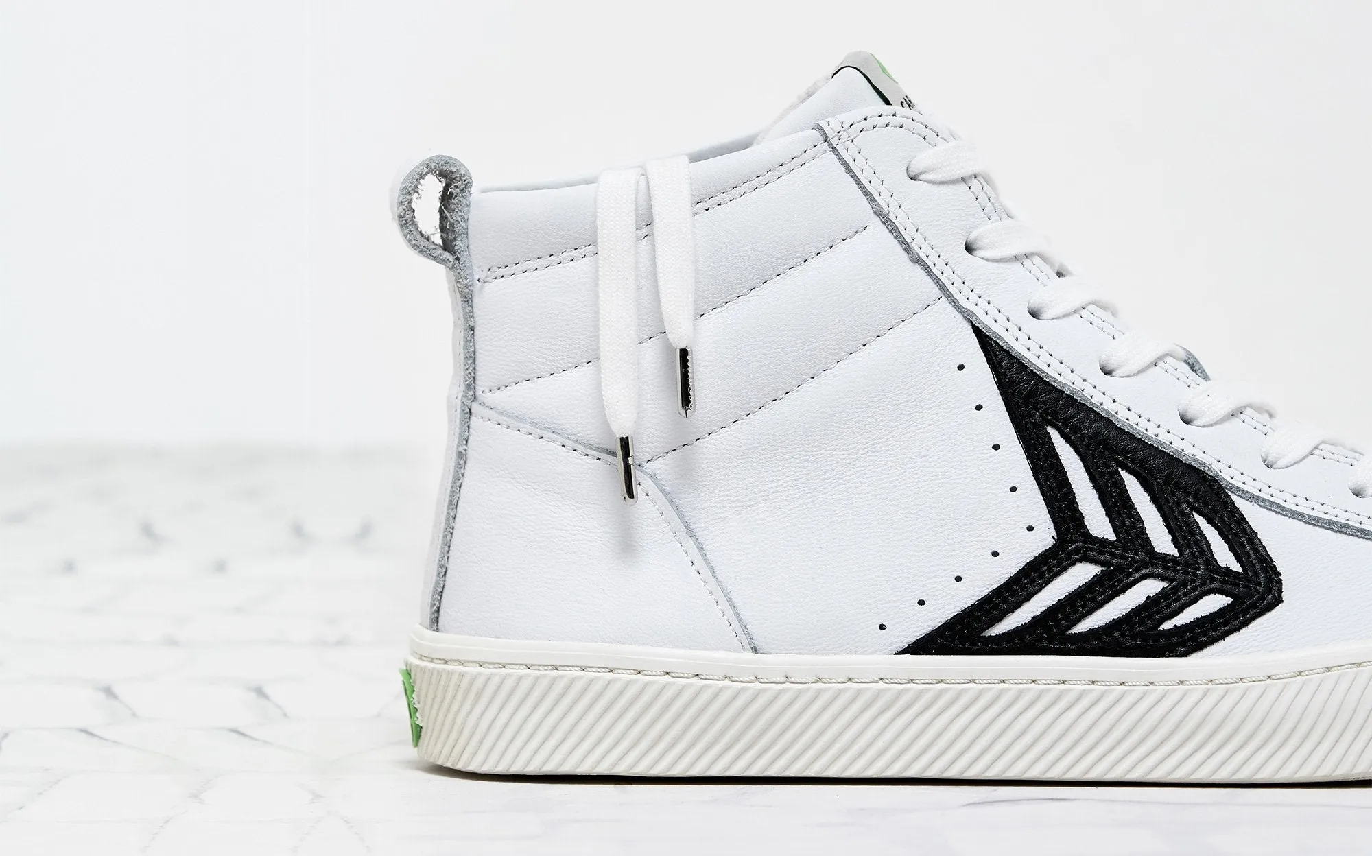 CATIBA High Off White Leather Black Logo Sneaker Women